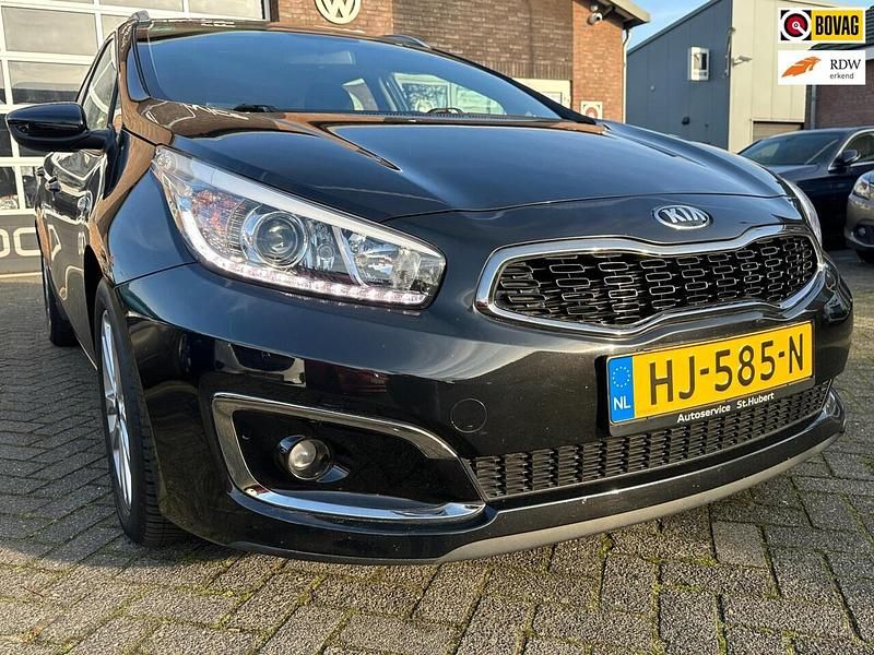 Zwart (metallic) Gebruikt 2015 Kia Ceed Sportswagon Stationwagen | € 8.950 (Goede deal) - Afbeelding 1/4