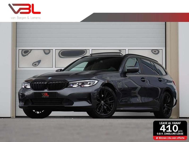 Grijs Gebruikt 2022 BMW 320e Executive Stationwagen | € 30.940 (Super prijs) - Afbeelding 1/4