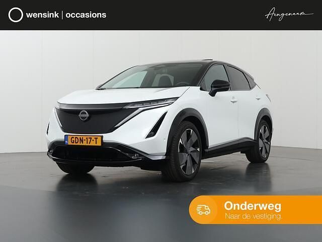 Wit Gebruikt 2024 Nissan Ariya Evolve SUV | € 41.945 (Goede deal) - Afbeelding 1/4