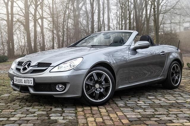 Grijs (metallic) Occasion 2010 Mercedes SLK200 Luxury Cabriolet | € 7.499 (Goede deal) - Afbeelding 1/4