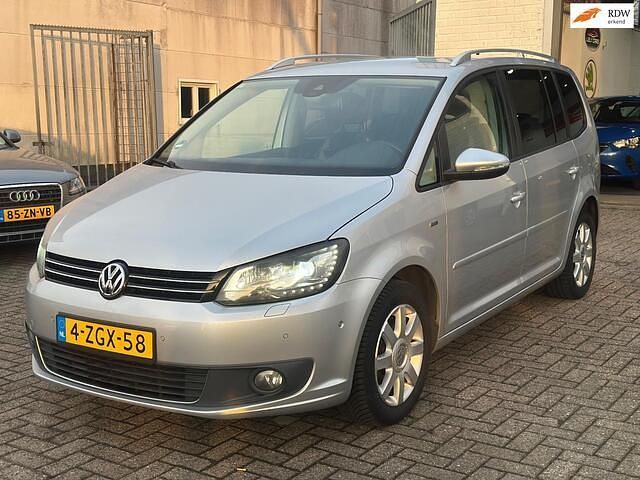 Grijs Occasion 2013 VW Touran Highline MPV | € 9.999 (Goede deal) - Afbeelding 1/4