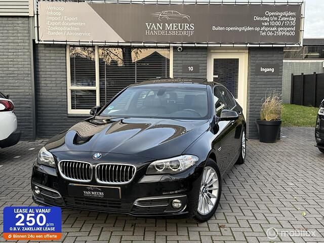Zwart Occasion 2014 BMW 520 Executive Sedan | € 15.450 (Eerlijke prijs) - Afbeelding 1/4
