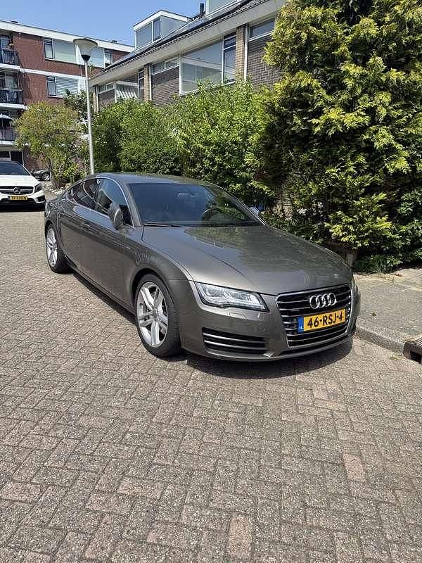 Grijs Gebruikt 2011 Audi A7 Hatchback | € 17.500 (Goede deal) - Afbeelding 1/2