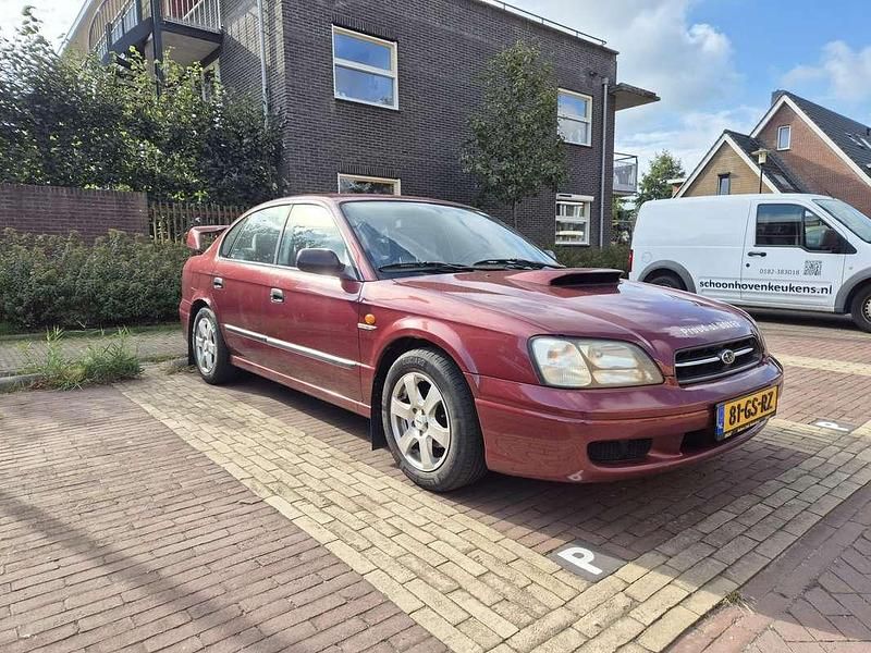 Rood Gebruikt 2001 Subaru Legacy Sedan | € 1.850 - Afbeelding 1/4