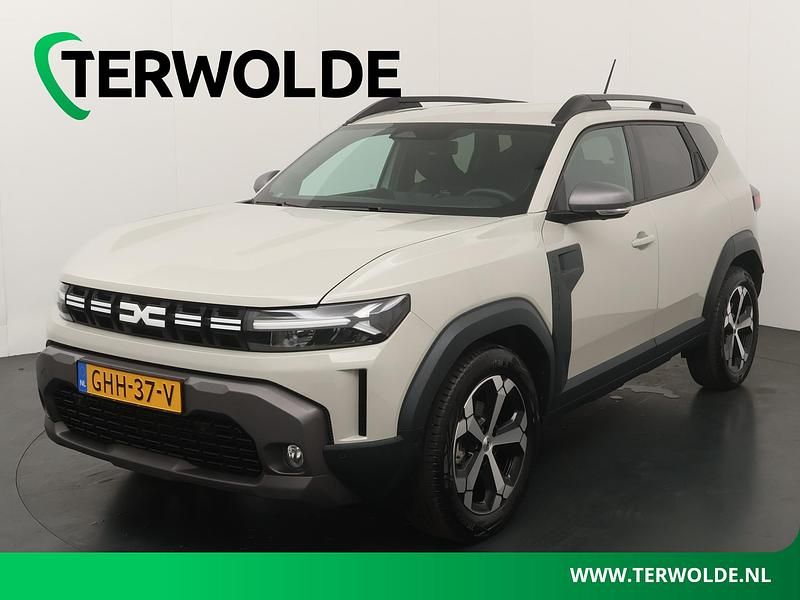 Bruin Gebruikt 2024 Dacia Duster Journey SUV | € 31.840 - Afbeelding 1/4