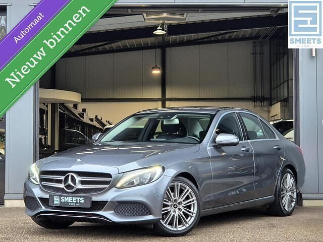 Grijs Gebruikt 2016 Mercedes C180 Ambition Sedan | € 15.900 (Super prijs) - Afbeelding 1/4