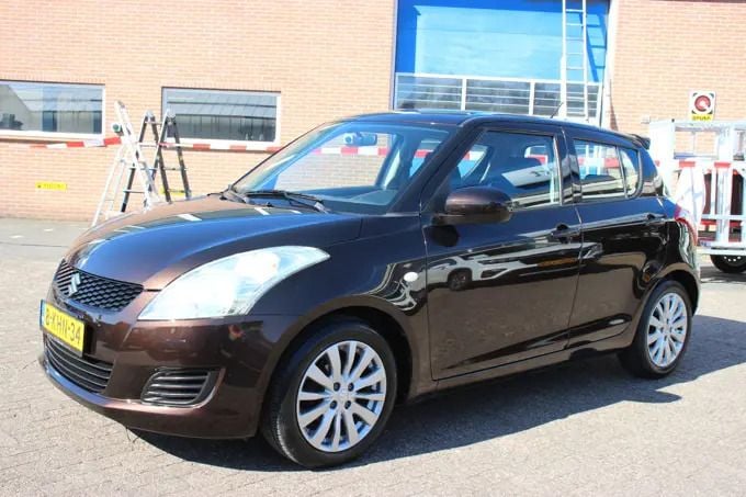 Bruin Gebruikt 2013 Suzuki Swift Hatchback | € 9.750 (Eerlijke prijs) - Afbeelding 1/3