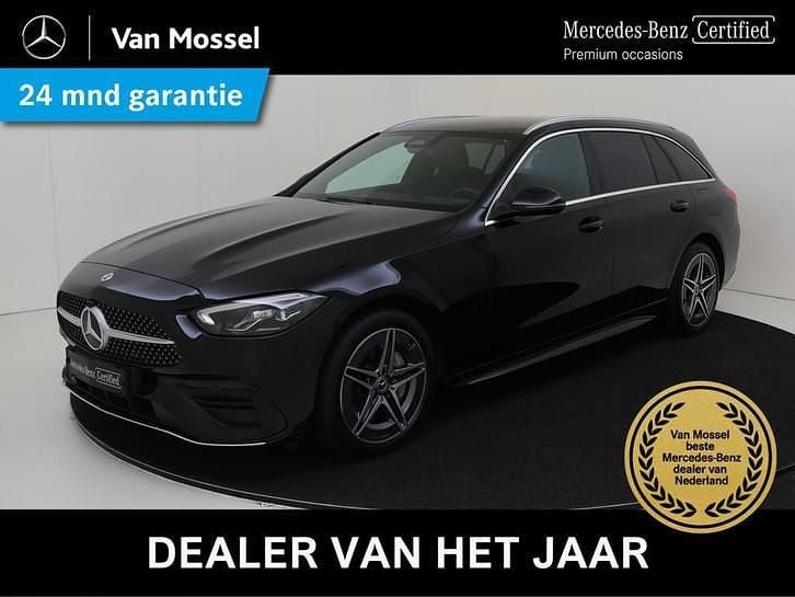 Zwart, metallic lak Occasion 2023 Mercedes C300e AMG line Stationwagen | € 38.945 (Super prijs) - Afbeelding 1/4