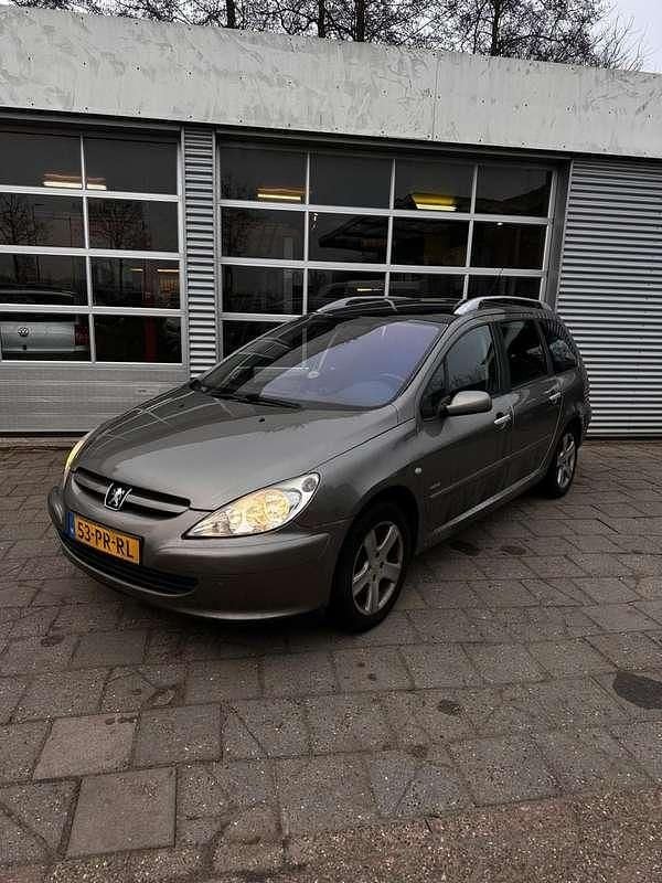 Grijs Occasion 2004 Peugeot 307 Stationwagen | € 699 (Goede deal) - Afbeelding 1/4