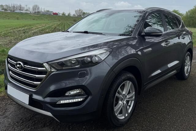 Zwart Gebruikt 2015 Hyundai Tucson Premium SUV | € 18.850 (Eerlijke prijs) - Afbeelding 1/4