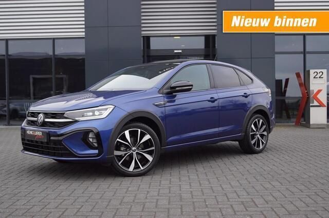 Blauw, metallic lak Gebruikt 2023 VW Taigo R-line SUV | € 28.750 (Iets duurder) - Afbeelding 1/4