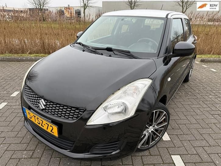 Zwart Occasion 2012 Suzuki Swift Hatchback | € 6.999 (Goede deal) - Afbeelding 1/4