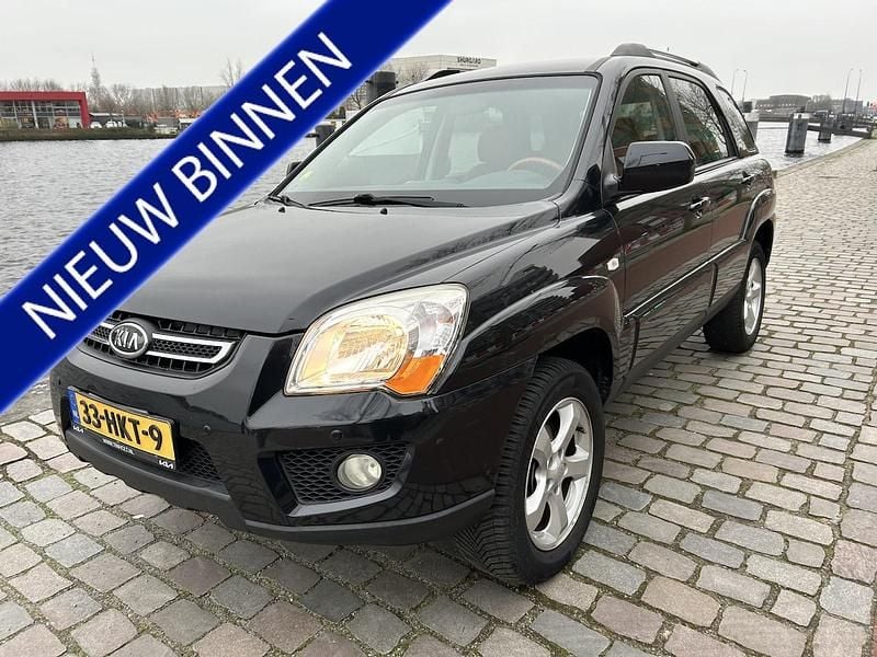 Zwart (metallic) Occasion 2009 Kia Sportage SUV | € 5.950 (Eerlijke prijs) - Afbeelding 1/4