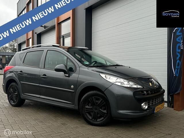 Grijs Occasion 2009 Peugeot 207 Stationwagen | € 999 (Goede deal) - Afbeelding 1/4