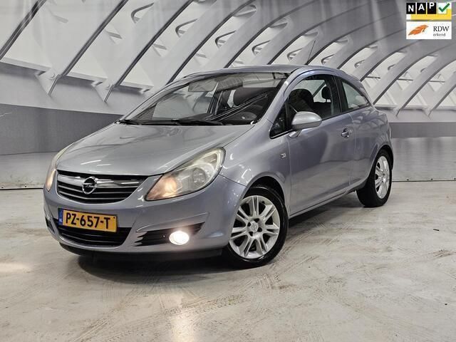 Grijs Gebruikt 2008 Opel Corsa Cosmo Hatchback | € 1.495 (Duur) - Afbeelding 1/3