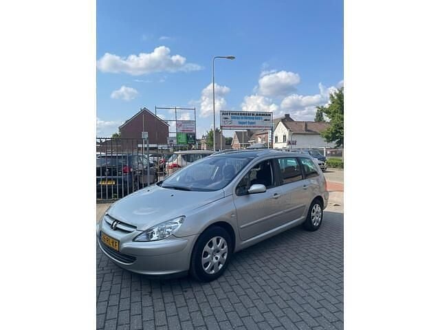 Grijs Gebruikt 2005 Peugeot 307 Premium Stationwagen | € 1.295 (Eerlijke prijs) - Afbeelding 1/4