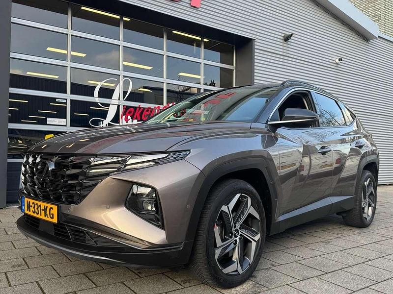 Bruin Occasion 2021 Hyundai Tucson Premium SUV | € 22.900 (Eerlijke prijs) - Afbeelding 1/4