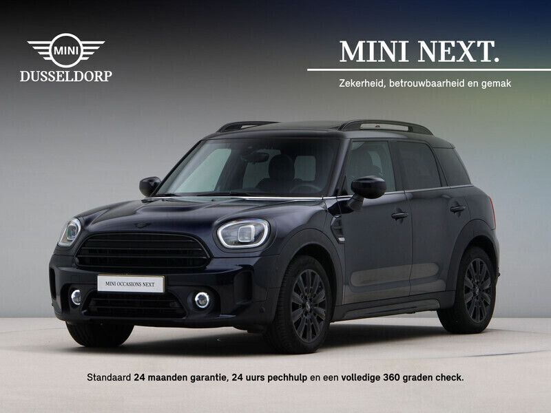 Enigmatic black (donker blauw metallic) Gebruikt 2023 Mini Cooper Countryman Business SUV | € 36.950 (Duur) - Afbeelding 1/4