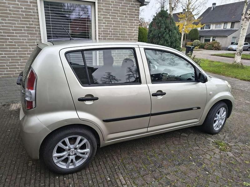 Occasion Daihatsu Sirion 69 PK (50 kW) 2010 Beige Hatchback