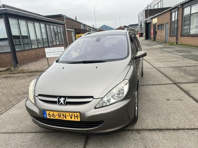 Grijs Gebruikt 2005 Peugeot 307 Premium Stationwagen | € 2.350 (Eerlijke prijs) - Afbeelding 1/4