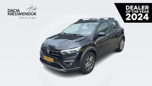 Noir nacre 676 Gebruikt 2021 Dacia Sandero Comfort Hatchback | € 11.995 (Eerlijke prijs) - Afbeelding 1/4