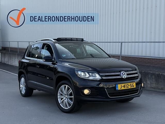 Zwart Gebruikt 2013 VW Tiguan SUV | € 11.999 (Goede deal) - Afbeelding 1/4