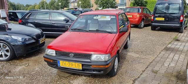 Rood Occasion 1991 Subaru Justy Hatchback | € 4.999 - Afbeelding 1/4