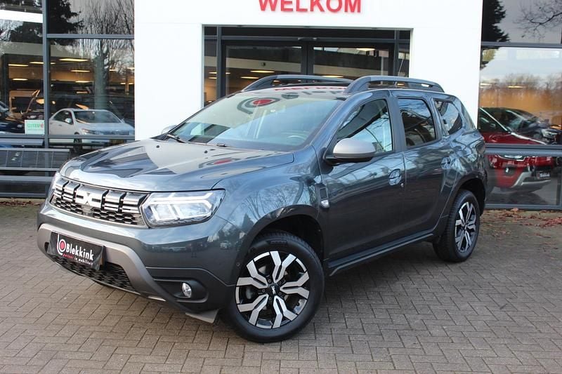 Grijs Occasion 2023 Dacia Duster Journey SUV | € 21.895 (Eerlijke prijs) - Afbeelding 1/4