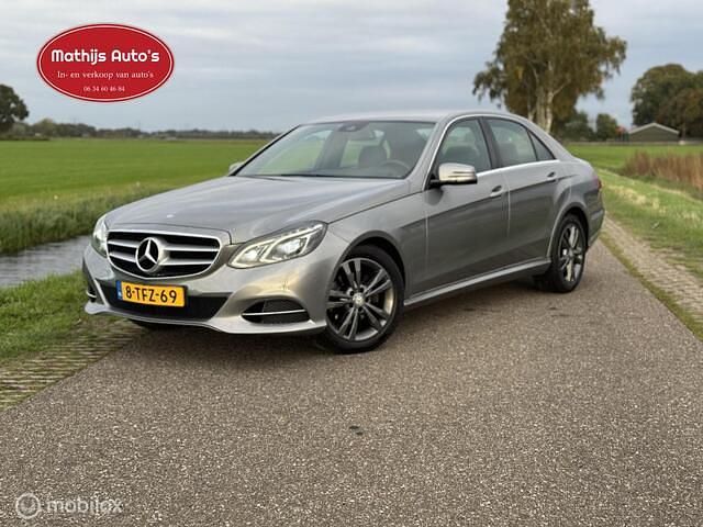 Grijs Gebruikt 2013 Mercedes E220 Ambition Sedan | € 9.950 (Goede deal) - Afbeelding 1/4