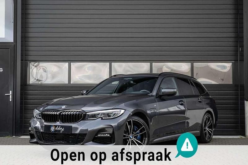 Grijs Gebruikt 2021 BMW 330e Executive Stationwagen | € 29.950 (Eerlijke prijs) - Afbeelding 1/4