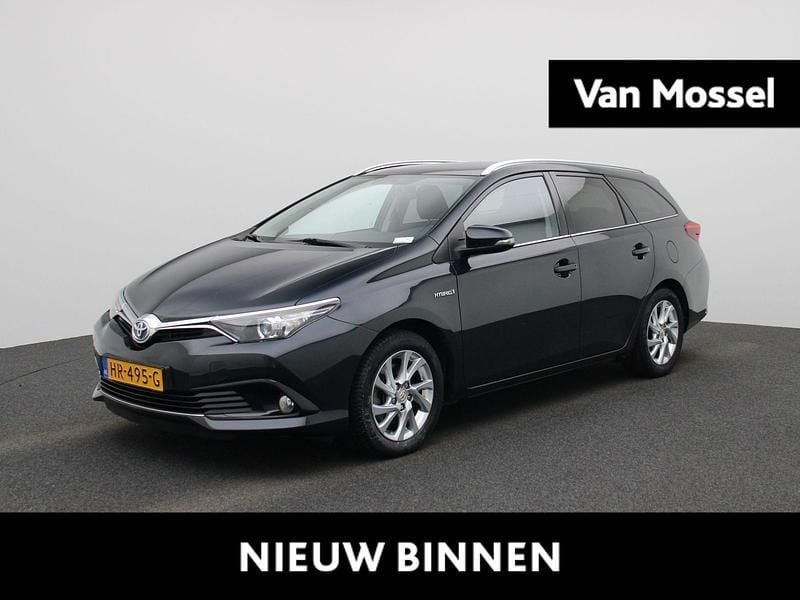 Grijs Gebruikt 2015 Toyota Auris Hybrid Hatchback | € 13.900 (Eerlijke prijs) - Afbeelding 1/4