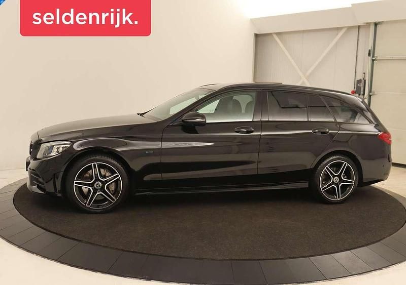 Zwart Gebruikt 2020 Mercedes C300e AMG Stationwagen | € 28.900 (Duur) - Afbeelding 1/4