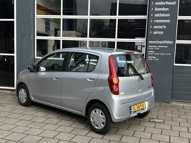 Occasion Daihatsu Cuore 69 PK (50 kW) 2008 Grijs (metallic) Hatchback