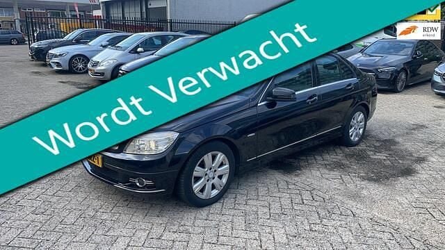 Zwart Occasion 2010 Mercedes C180 Avantgarde Sedan | € 7.745 (Eerlijke prijs) - Afbeelding 1/4