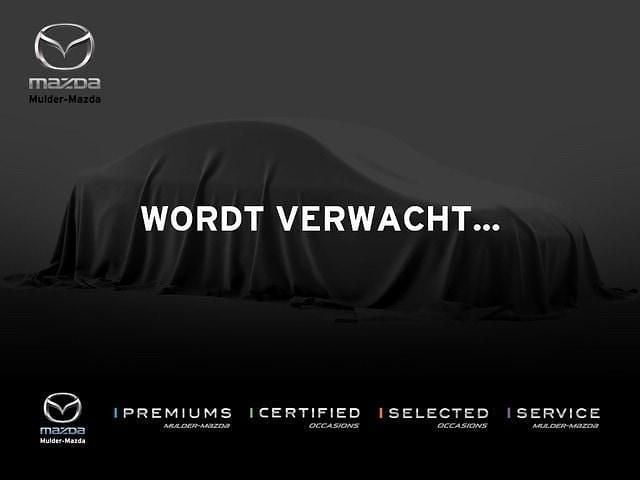 Titanium flash (bruin metallic) Gebruikt 2015 Mazda 2 Dynamic Hatchback | € 11.950 (Eerlijke prijs) - Afbeelding 1/2