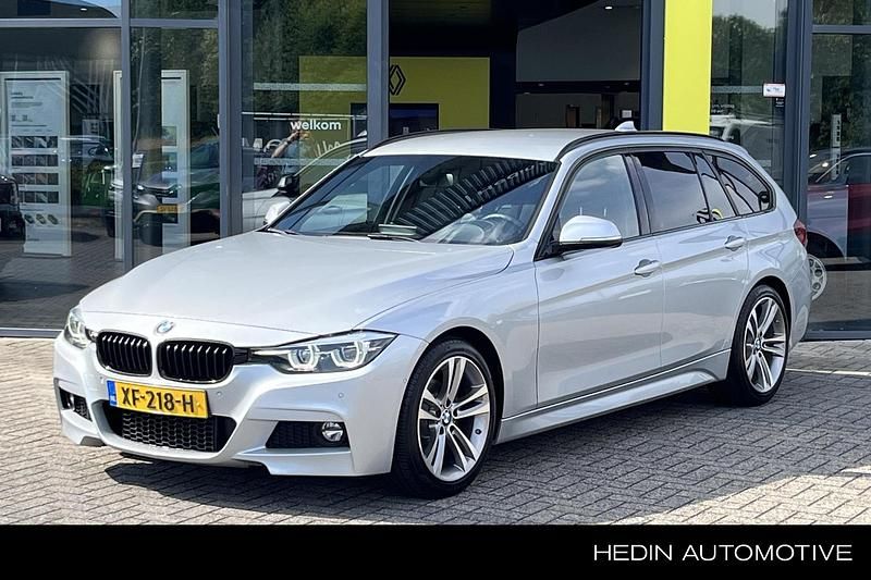 Grijs Gebruikt 2019 BMW 320 M Sport Stationwagen | € 24.450 (Goede deal) - Afbeelding 1/4