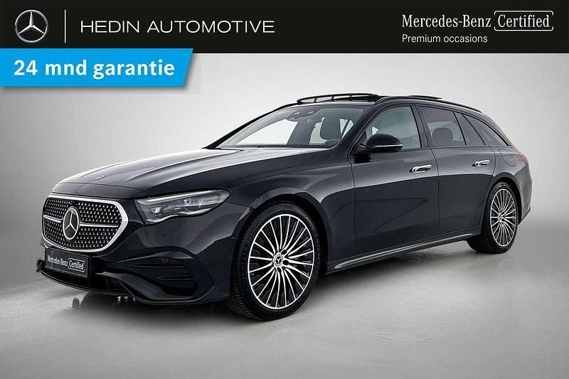 Zwart, metallic lak Gebruikt 2024 Mercedes E300 AMG line Stationwagen | € 69.900 - Afbeelding 1/4