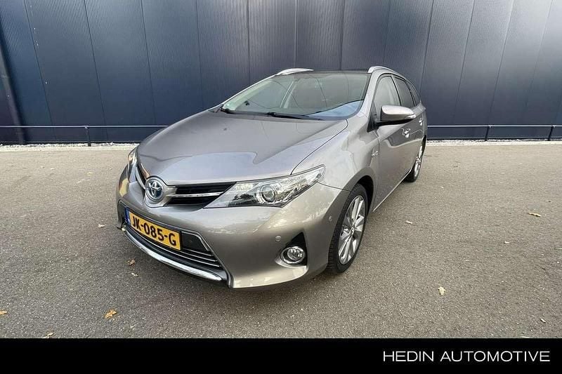 Bruin Occasion 2015 Toyota Auris Touring Sports Executive Stationwagen | € 14.890 (Eerlijke prijs) - Afbeelding 1/4