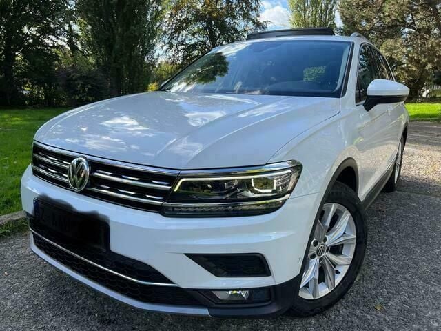 Zwart Gebruikt 2019 VW Tiguan SUV | € 26.499 (Goede deal) - Afbeelding 1/4