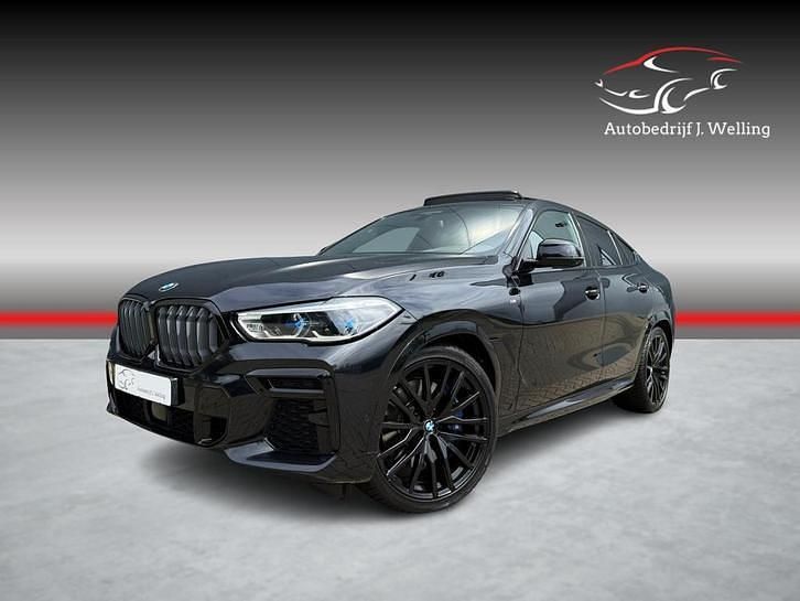 , metallic lak Gebruikt 2022 BMW X6 M Sport SUV | € 83.990 - Afbeelding 1/4