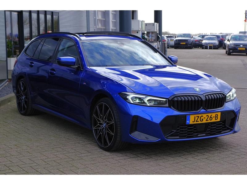 Occasion BMW 330 294 PK (216 kW) 2023 Blauw Stationwagen