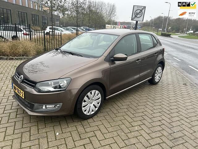 Bruin (metallic) Gebruikt 2012 VW Polo Comfortline Hatchback | € 3.995 (Goede deal) - Afbeelding 1/4