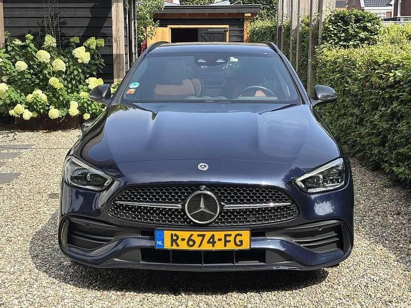 Blauw Gebruikt 2022 Mercedes C300e AMG line Stationwagen | € 36.500 (Eerlijke prijs) - Afbeelding 1/4