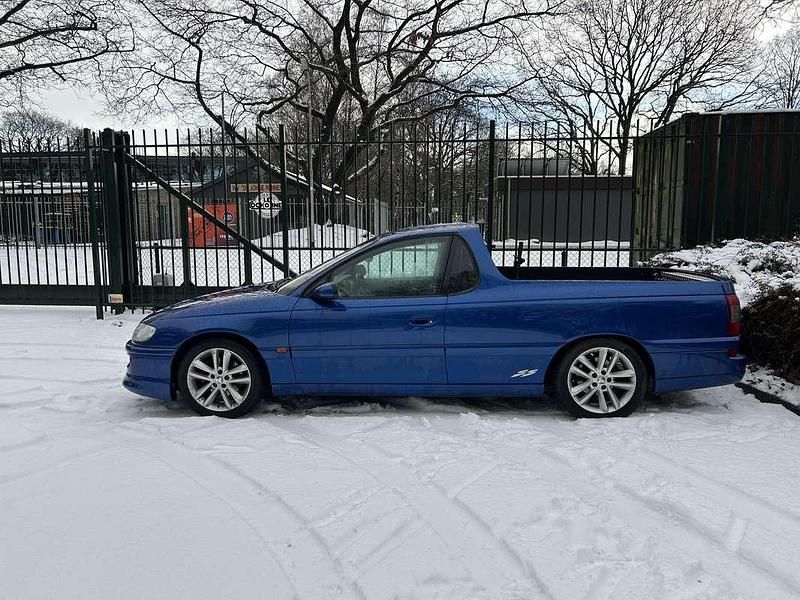 Occasion Opel Omega Basis 170 PK (125 kW) 1996 Blauw Pickup