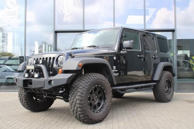 Zwart Gebruikt 2015 Jeep Wrangler SUV | € 39.950 (Eerlijke prijs) - Afbeelding 1/4
