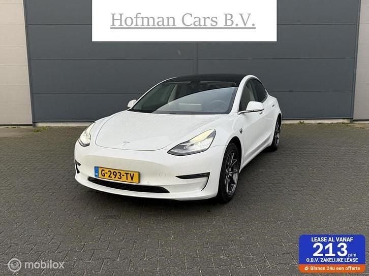 Wit (parellak) Gebruikt 2019 Tesla Model 3 Sedan | € 15.900 (Goede deal) - Afbeelding 1/4