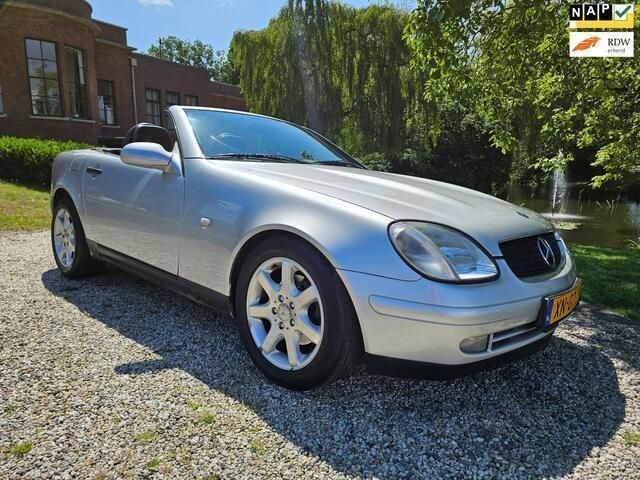 Grijs Gebruikt 1999 Mercedes SLK200 Cabriolet | € 4.499 (Eerlijke prijs) - Afbeelding 1/4