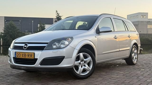Grijs Gebruikt 2007 Opel Astra Cosmo Stationwagen | € 1.599 (Goede deal) - Afbeelding 1/4