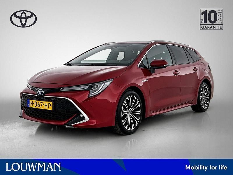 Rood metallic Gebruikt 2020 Toyota Corolla Executive Stationwagen | € 24.945 (Iets duurder) - Afbeelding 1/4