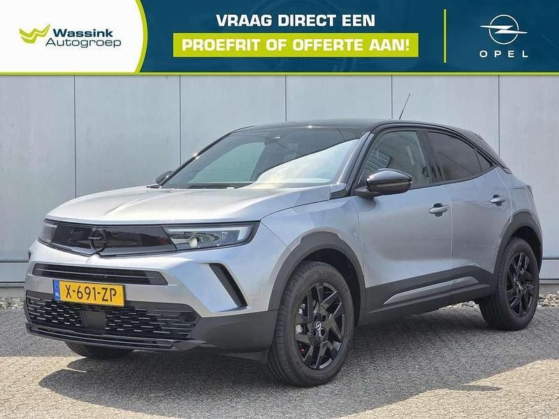 Grijs, metallic lak Gebruikt 2024 Opel Mokka GS Line SUV | € 26.900 (Eerlijke prijs) - Afbeelding 1/4